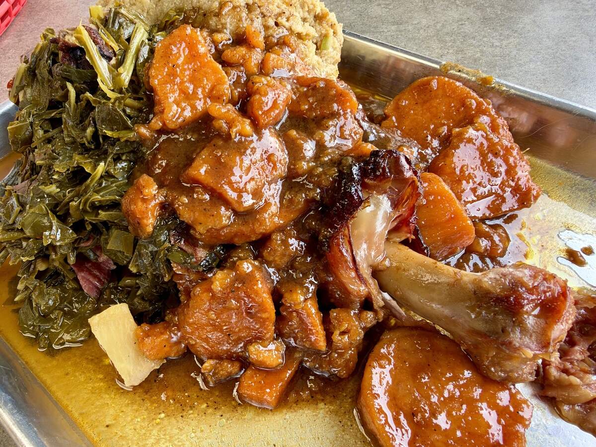 That'’s a smoked turkey leg smothered with collard greens, yams and cornbread dressing, served by Chef Adams Soul Food at Jambo’s BBQ at the Arlington Steakhouse, as seen Oct. 25, 2026 in Arlington, Texas.