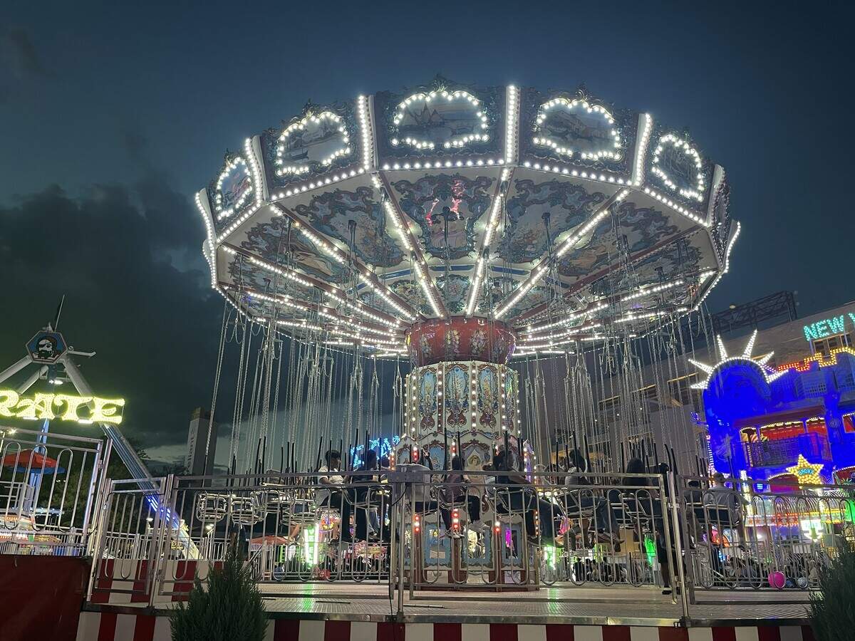 Midway rides and carnival games were crowded as ever on Oct. 15, 2026 at the State Fair of Texas in Dallas.