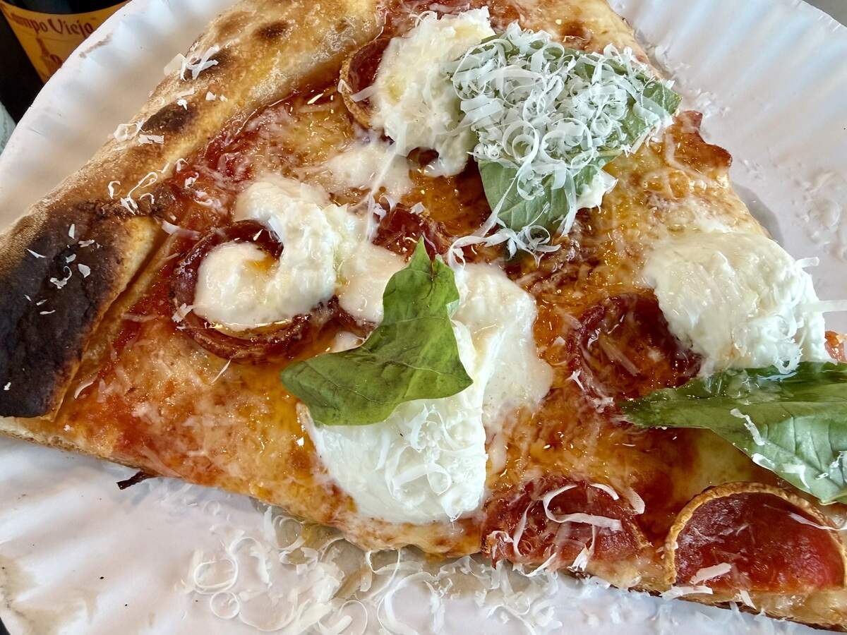 A pizza with pepperoni, burrata, basil and oil at Ozzi’s Pizza in Fort Worth, Texas, Dec. 27, 2025.