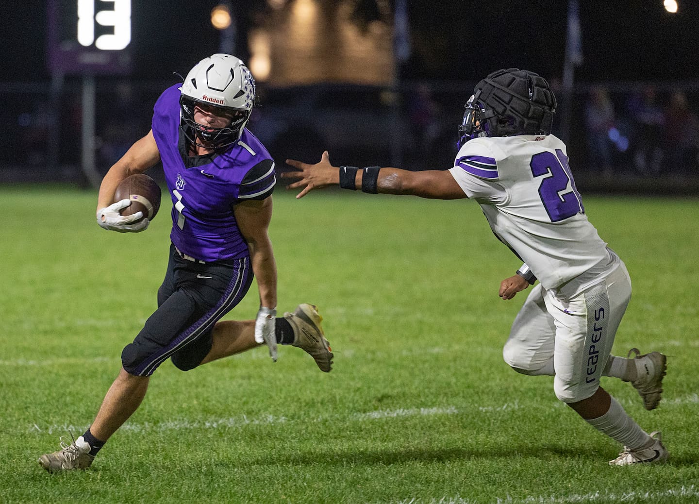 Dixon’s Brenden Kastner looks for running room while being chased by Plano’s Fernando Carrillo Friday, Oct. 23, 2026.