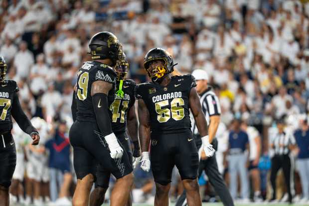 Colorado junior defensive end Lamont Lester Jr. (56) celebrates with teammates after a sack in a game against Georgia Tech on Thursday, Sept. 3, 2026 at Bobby Dodd Stadium in Atlanta. (Courtesy of CU Athletics)