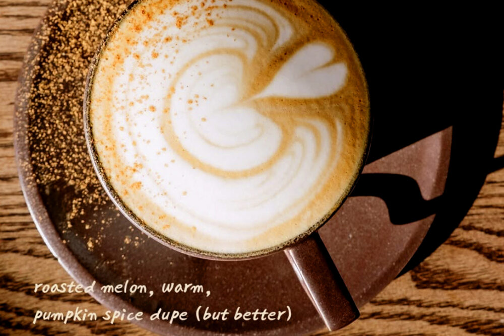 A cup pof coffee with foam art