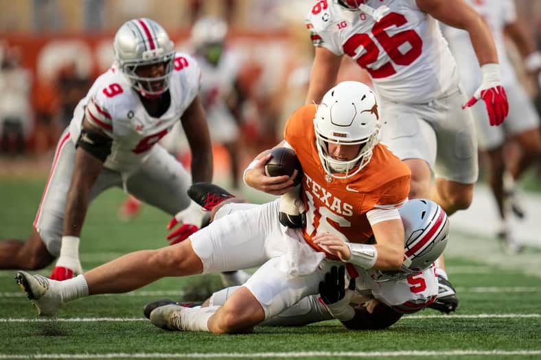 Ohio State Buckeyes linebacker Riley Pettijohn (5) sacks Texas Longhorns quarterback Arch Manning (16) during the NCAA football
