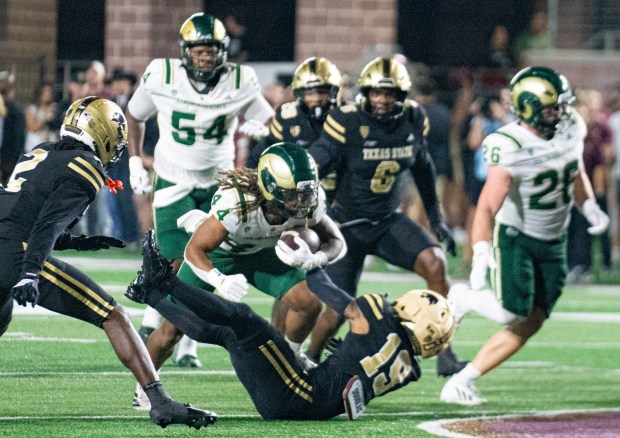 Colorado State running back Oliver Lundberg pushes forward for yardage against Texas State on Thursday in San Marcos, Texas. (Provided by CSU Athletics)