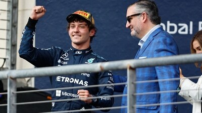 Mercedes' Andrea Kimi Antonelli celebrates on the podium after winning the United States Grand Prix alongside United States Senator Ted Cruz. (IMAGN IMAGES via Reuters)