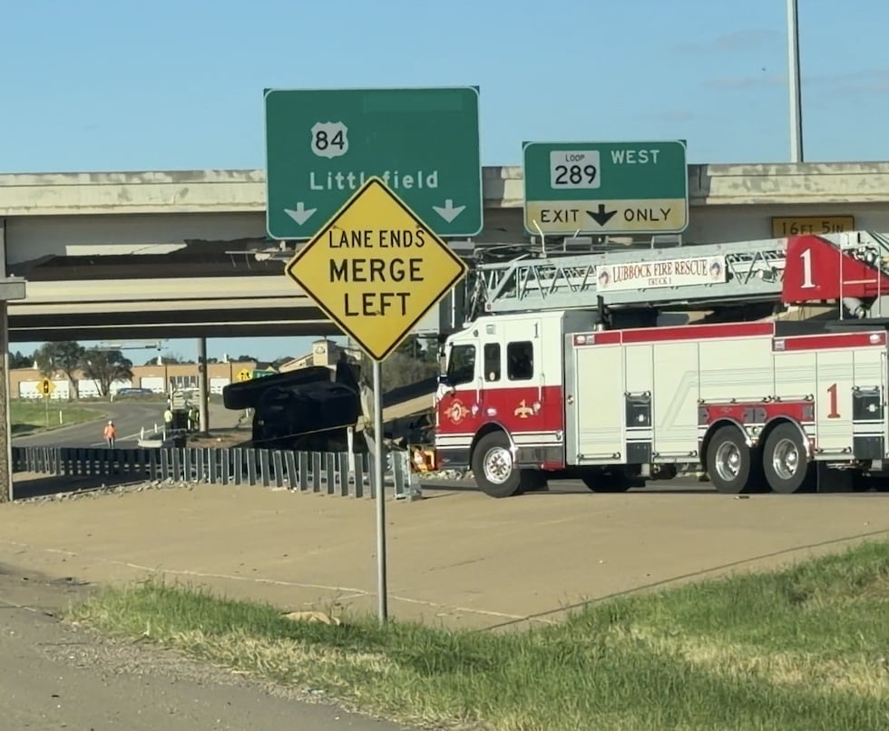 Truck hit bridge, I-27 access road traffic diverted at South Loop 289