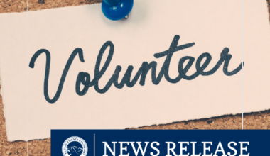 News release graphic featuring a cork board with the word Volunteer pinned to it