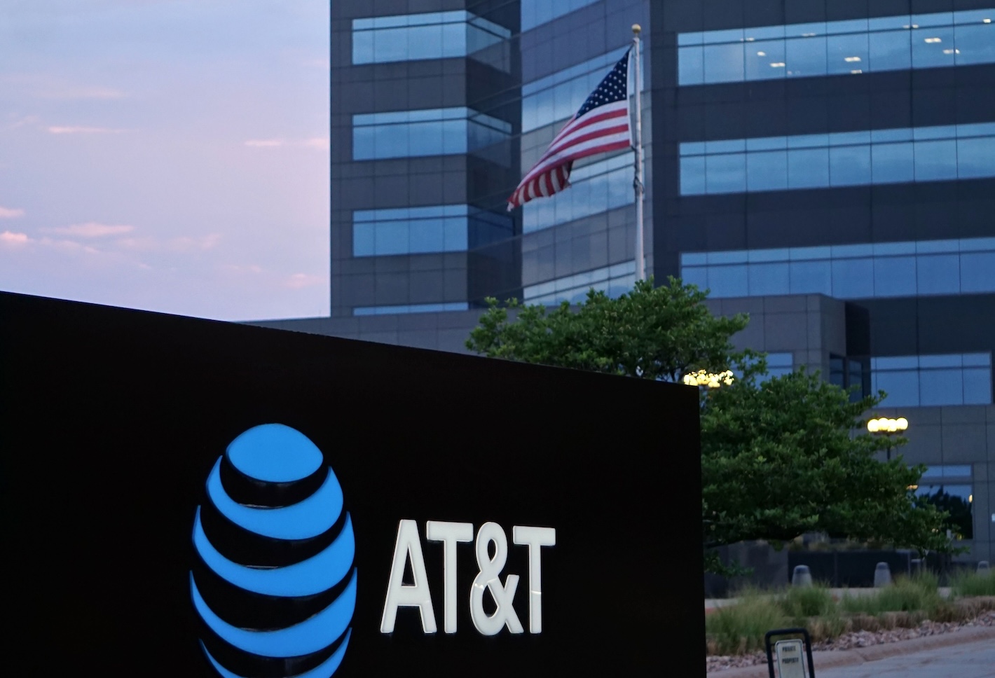AT&T sign in front of an office building.