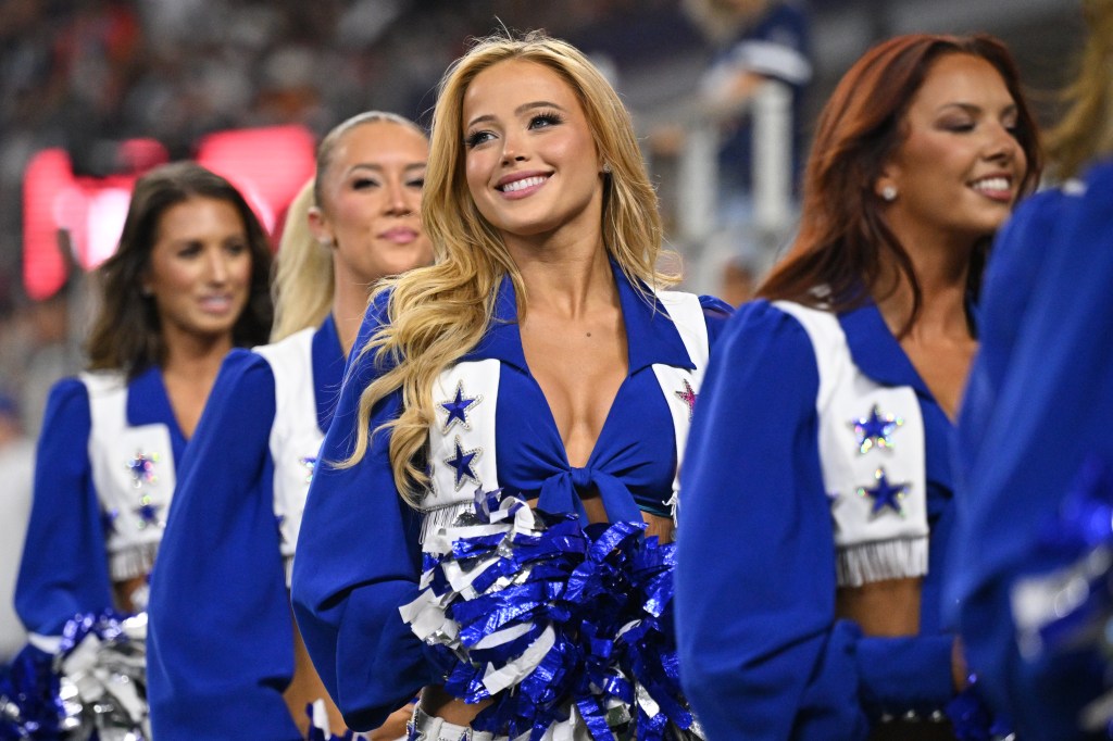 Dallas Cowboys Cheerleader Kylie Dickinson performs on the field.