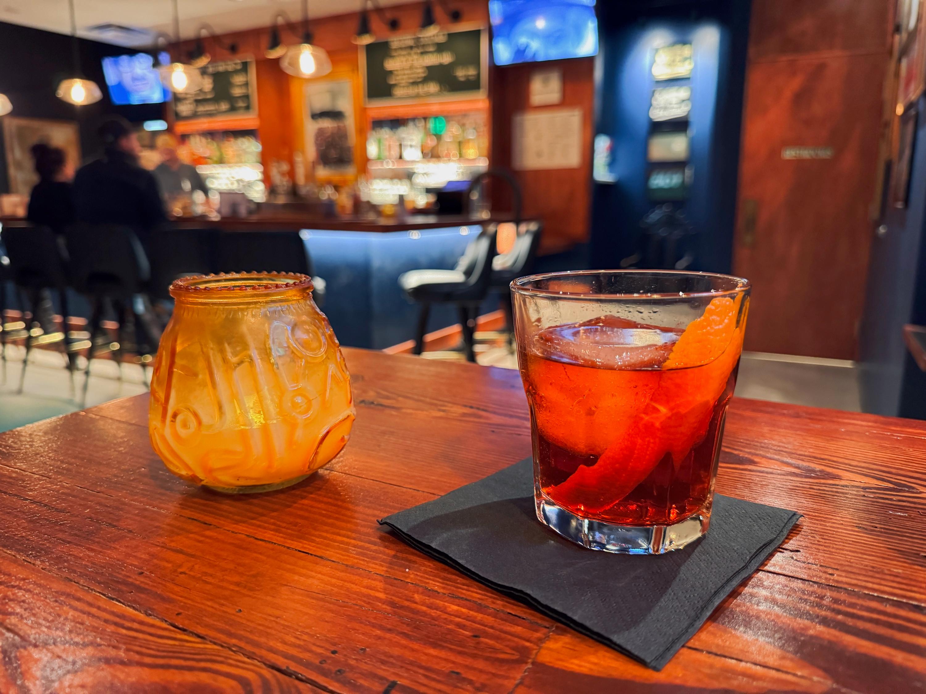 a cocktail on a table at Easy Slider