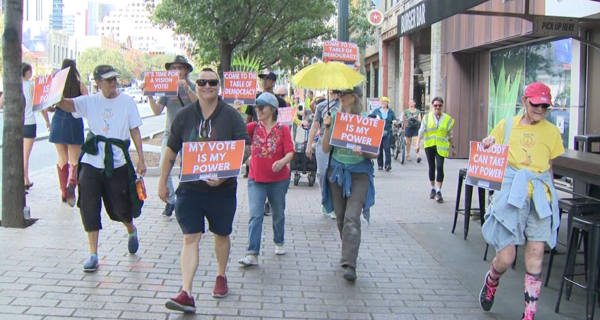 Austin march urges voters to cast ballots early during midterm election