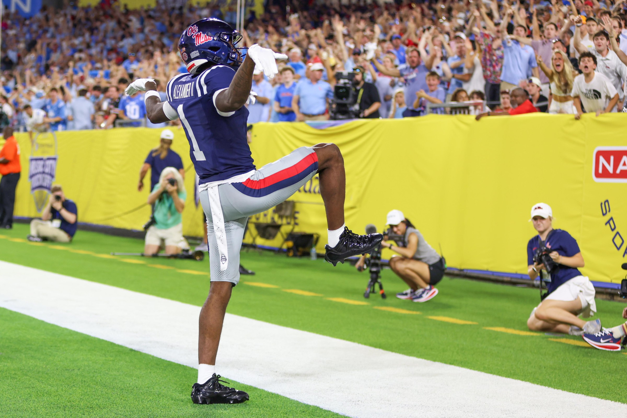 NASHVILLE, TENNESSEE - SEPTEMBER 6: Deuce Alexander #1 of the Ole Miss Rebels celebrates scoring a touchdown during a game between the Ole Miss Rebels and the Louisville Cardinals at Nissan Stadium on September 6, 2026 in Nashville, Tennessee. (Photo by Roger Wimmer/ISI Photos/ISI Photos via Getty Images)