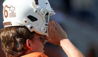 AUSTIN, TX - OCTOBER 17: Texas Longhorns quarterback Arch Manning #16 readies to pull his helmet onto his head ahead of the SEC football game between the Texas Longhorns and Florida Gators on October 17, 2026, at Darrell K Royal-Texas Memorial Stadium in Austin, TX. (Photo by David Buono/Icon Sportswire via Getty Images)