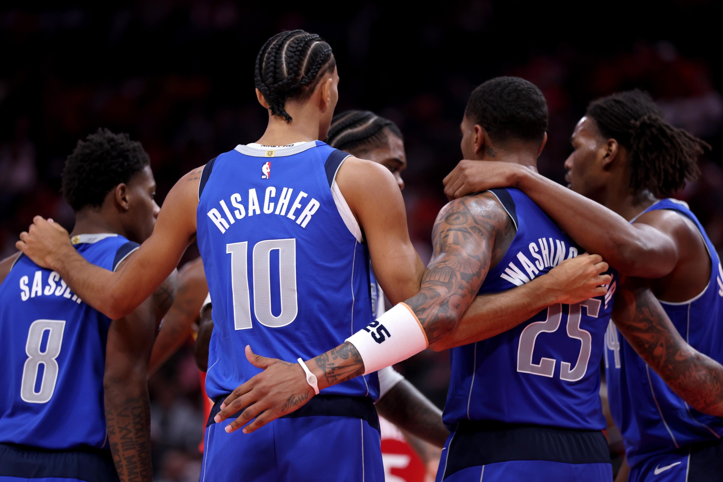 HOUSTON, TEXAS - OCTOBER 21: The Dallas Mavericks huddle during the game against the Houston Rockets at Toyota Center on October 21, 2026 in Houston, Texas. NOTE TO USER: User expressly acknowledges and agrees that, by downloading and or using this photograph, User is consenting to the terms and conditions of the Getty Images License Agreement. (Photo by Kenneth Richmond/Getty Images)