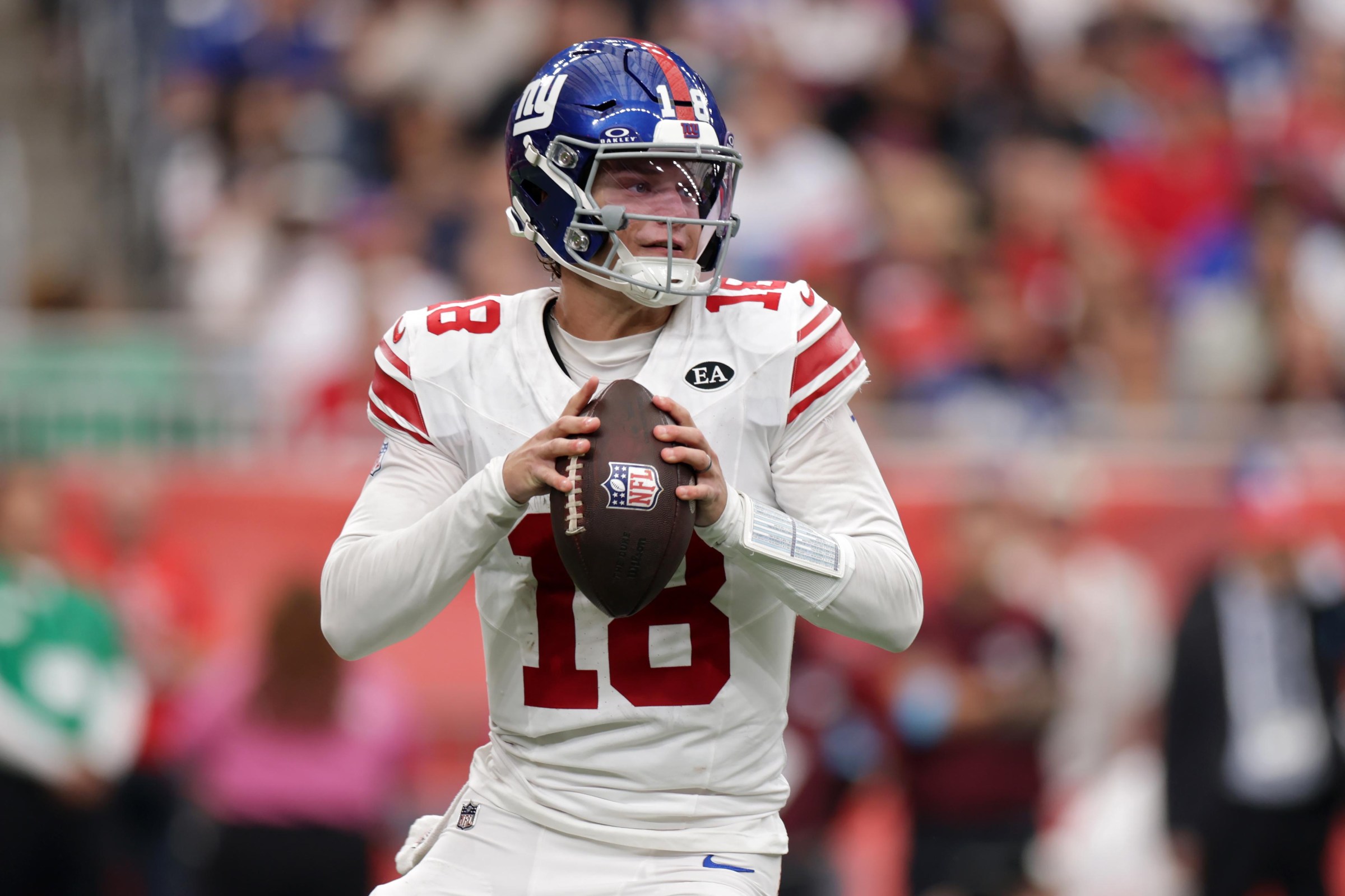 HOUSTON, TEXAS - OCTOBER 25: J.J. McCarthy #18 of the New York Giants throws a pass during the fourth quarter against the Houston Texans at NRG Stadium on October 25, 2026 in Houston, Texas. (Photo by Kenneth Richmond/Getty Images)