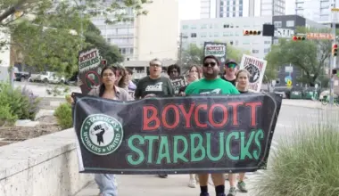 Austin union baristas demand Starbucks finalize fair union contract during UT rally