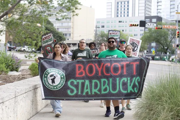 Austin union baristas demand Starbucks finalize fair union contract during UT rally