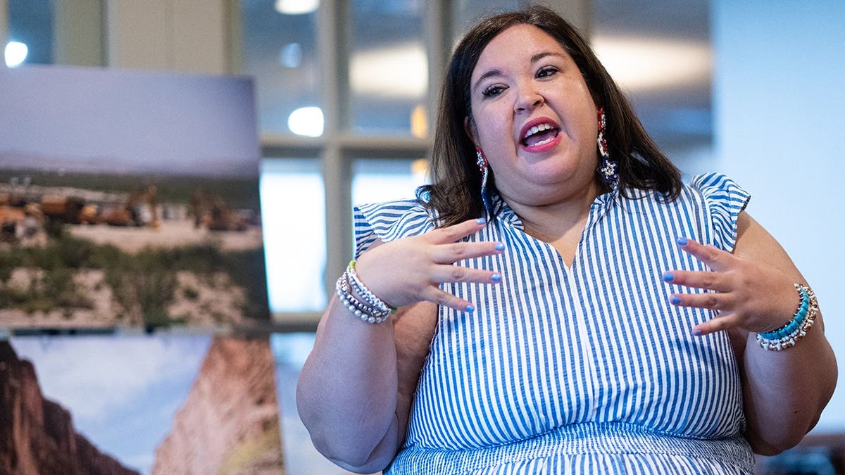 Katy Padilla Stout speaks at a Denny's restaurant in San Antonio.