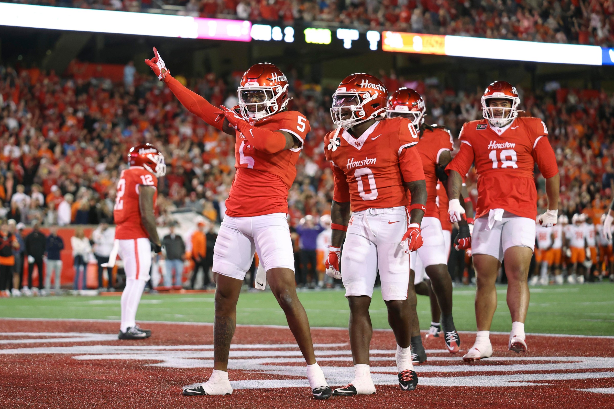 Oct 17, 2026; Houston, Texas, USA; Houston Cougars defensive back Will James (5) celebrates after a defensive play during the second quarter against the Oklahoma State Cowboys at TDECU Stadium. Mandatory Credit: Troy Taormina-Imagn Images