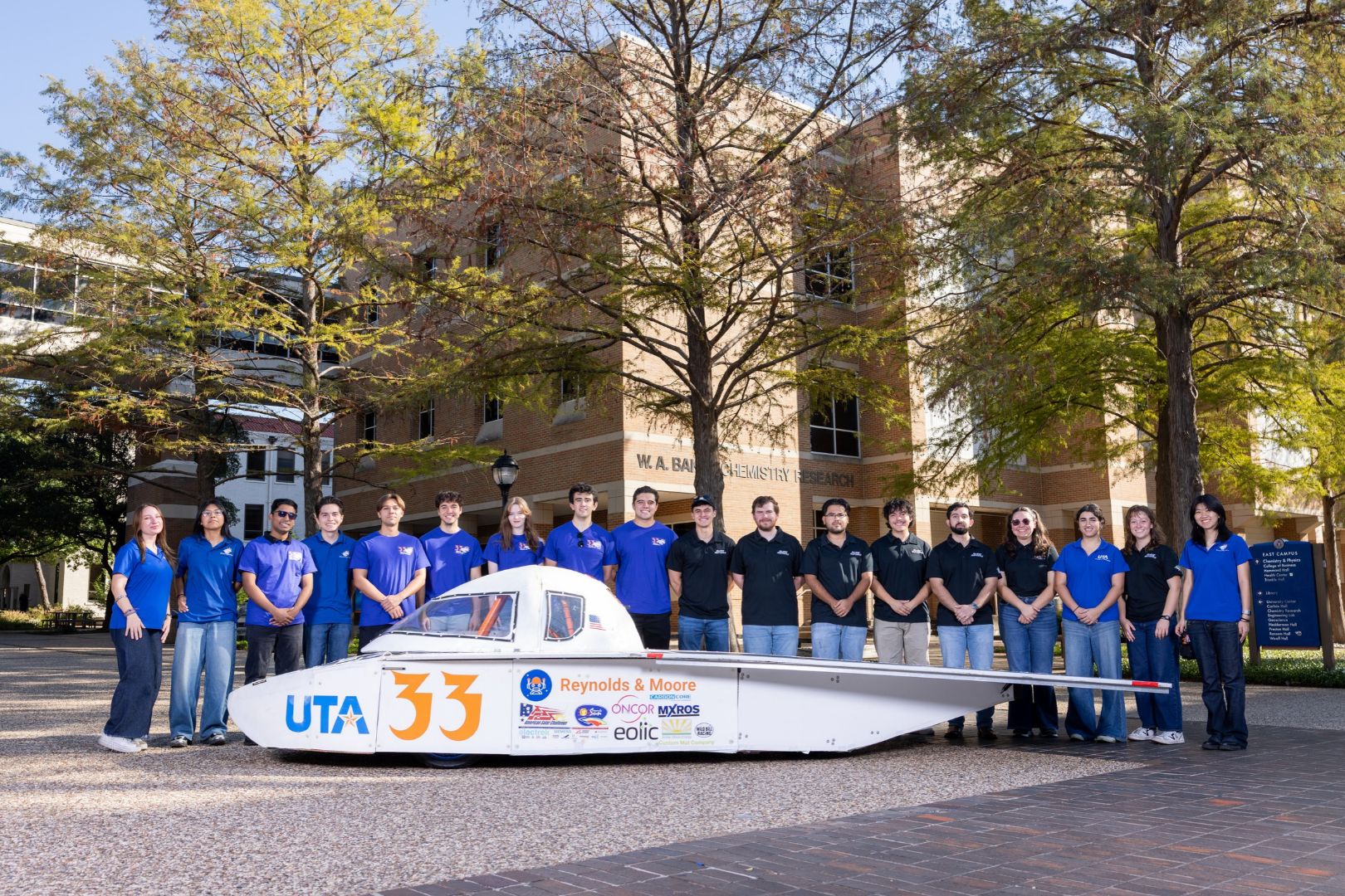 Image shows the UTA Blaze Raycers team posing with the solar car " style=" height:1080px; width:1620px" _languageinserted="true" src="https://cdn.prod.web.uta.edu/-/media/project/website/news/releases/2026/10/solar-inside-2.jpg