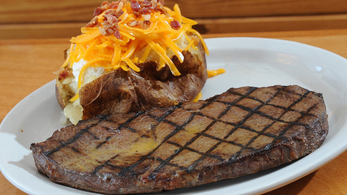 16 oz USDA choice sirloin at Texas Roadhouse with baked potato.