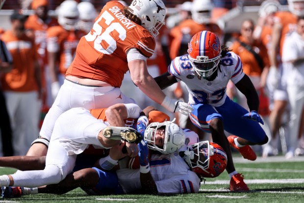 AUSTIN, TEXAS - OCTOBER 17: Lj McCray #11 of the Florida Gators sacks Arch Manning #16 of the Texas Longhorns in the fourth quarter at Darrell K Royal-Texas Memorial Stadium on October 17, 2026 in Austin, Texas. (Photo by Tim Warner/Getty Images)