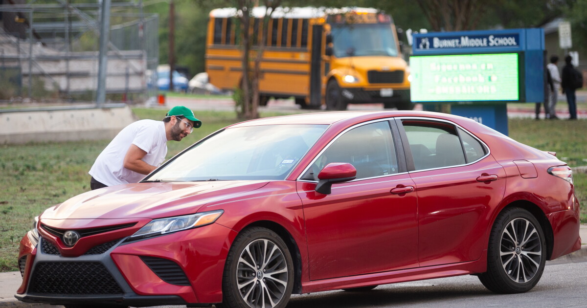 Volunteers race to collect signatures to close Austin schools and avoid takeover