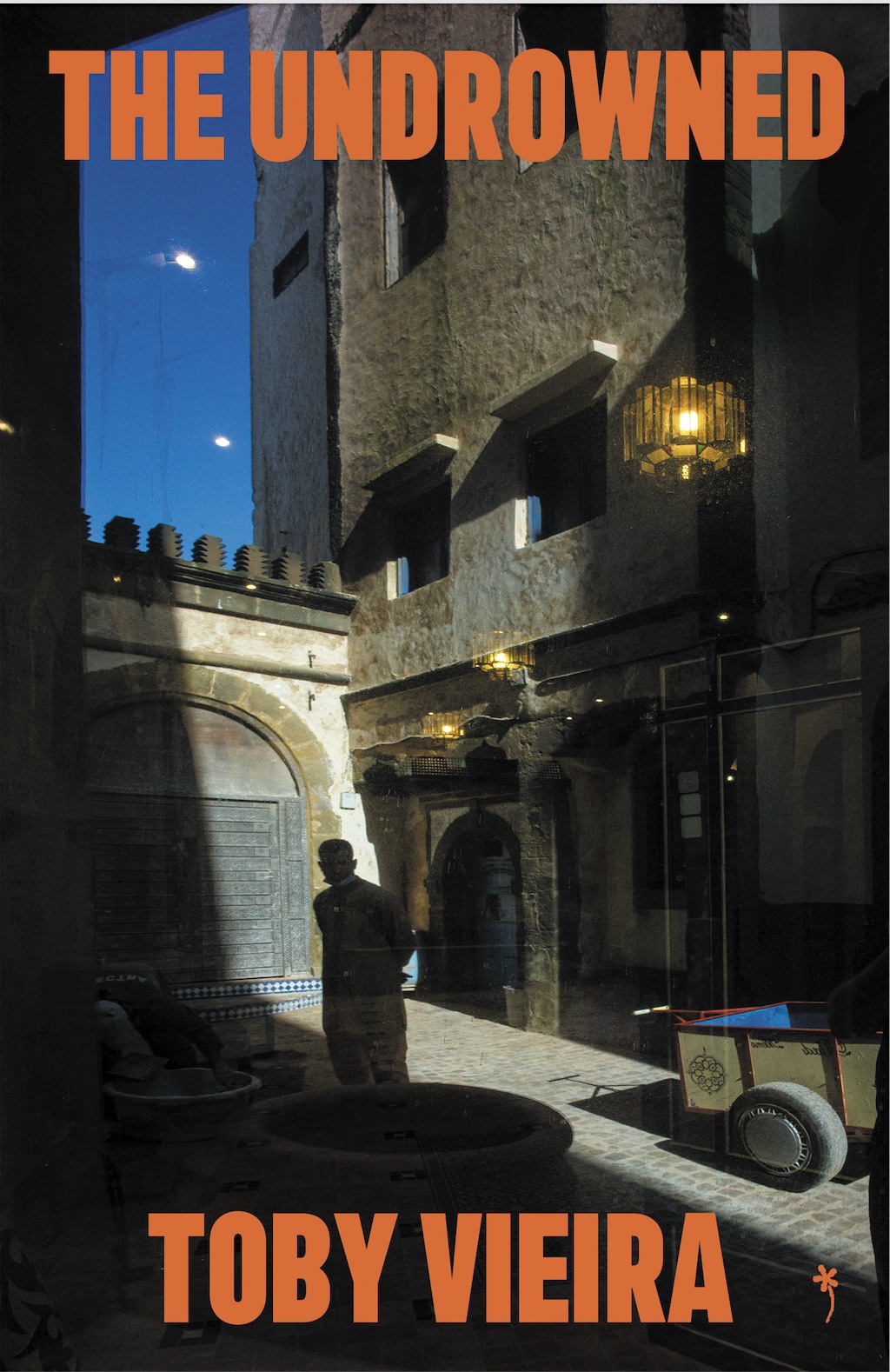 Book cover for "The Undrowned" by Toby Vieira, showing a shadowy alleyway.