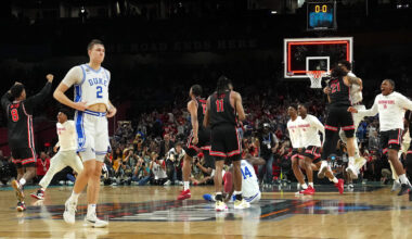 Apr 5, 2025; San Antonio, TX, USA; Duke Blue Devils forward Cooper Flagg (2) walks off the court as Houston Cougars players celebrate after Houston’s semifinal win in the men's 2025 NCAA tournament at Alamodome. Mandatory Credit: Bob Donnan-Imagn Images