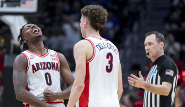 Mar 23, 2025; Seattle, WA, USA;  Arizona Wildcats guard Jaden Bradley (0) reacts with guard Anthony Dell'Orso (3) in the game against the Oregon Ducks in the second half at Climate Pledge Arena. Mandatory Credit: Stephen Brashear-Imagn Images