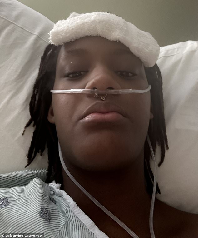 JaMarriae Lawrence, who goes by Mars, was working overnight at a Walmart distribution center in Virginia last year when she was hit with a 'sudden, excruciating' pain in her stomach