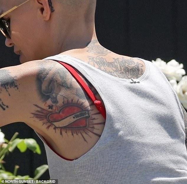 The Batwoman star has removed a tattoo of her ex-girlfriend Phoebe Dahl's name from inside a red heart on her left shoulder