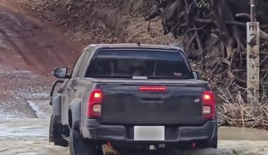 A massive crocodile could be seen stuck underneath a ute at Cahills Crossing in Kakadu National Park in the Northern Territory on Sunday around 12pm