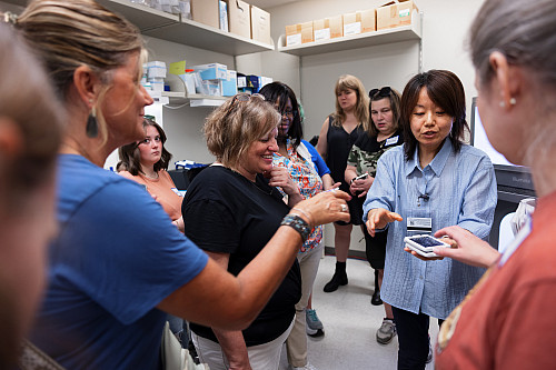 P12 science educators get a first-hand look at DNA sequencing equipment. Photo by Liz Kaye, Indiana University