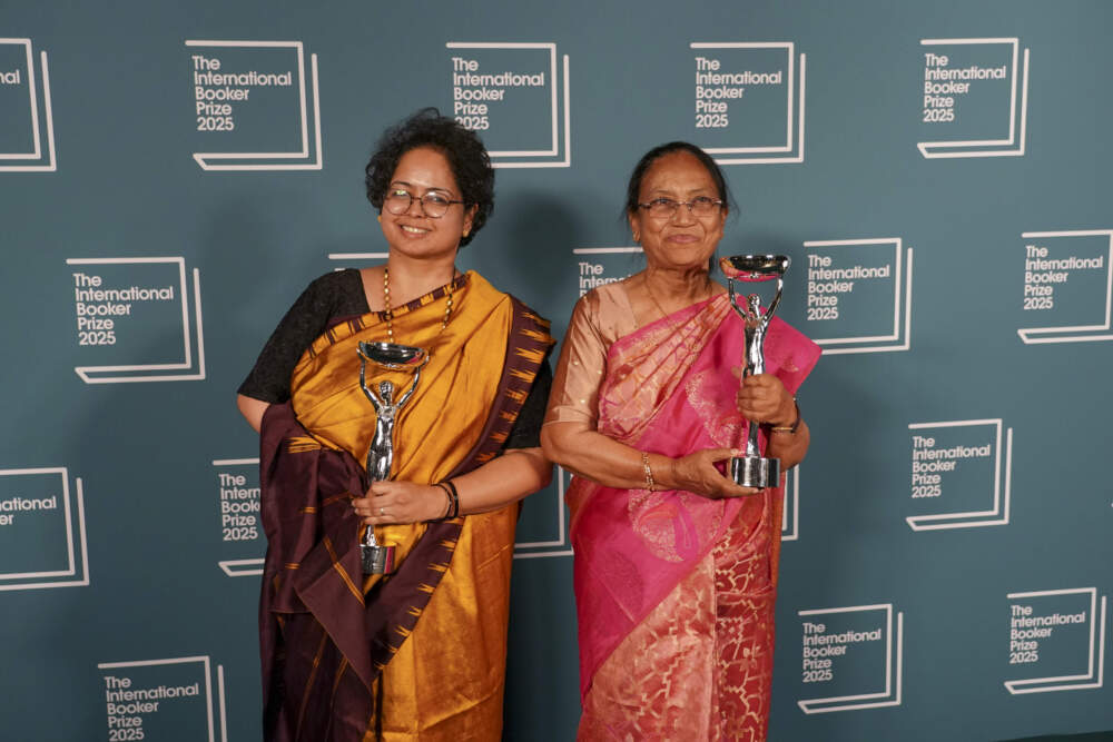 Banu Mushtaq, author of "Heart Lamp," right, and Deepa Bhasthi hold the trophies after winning the International Booker Prize, in London, Tuesday, May 20, 2025.(Alberto Pezzali/AP)