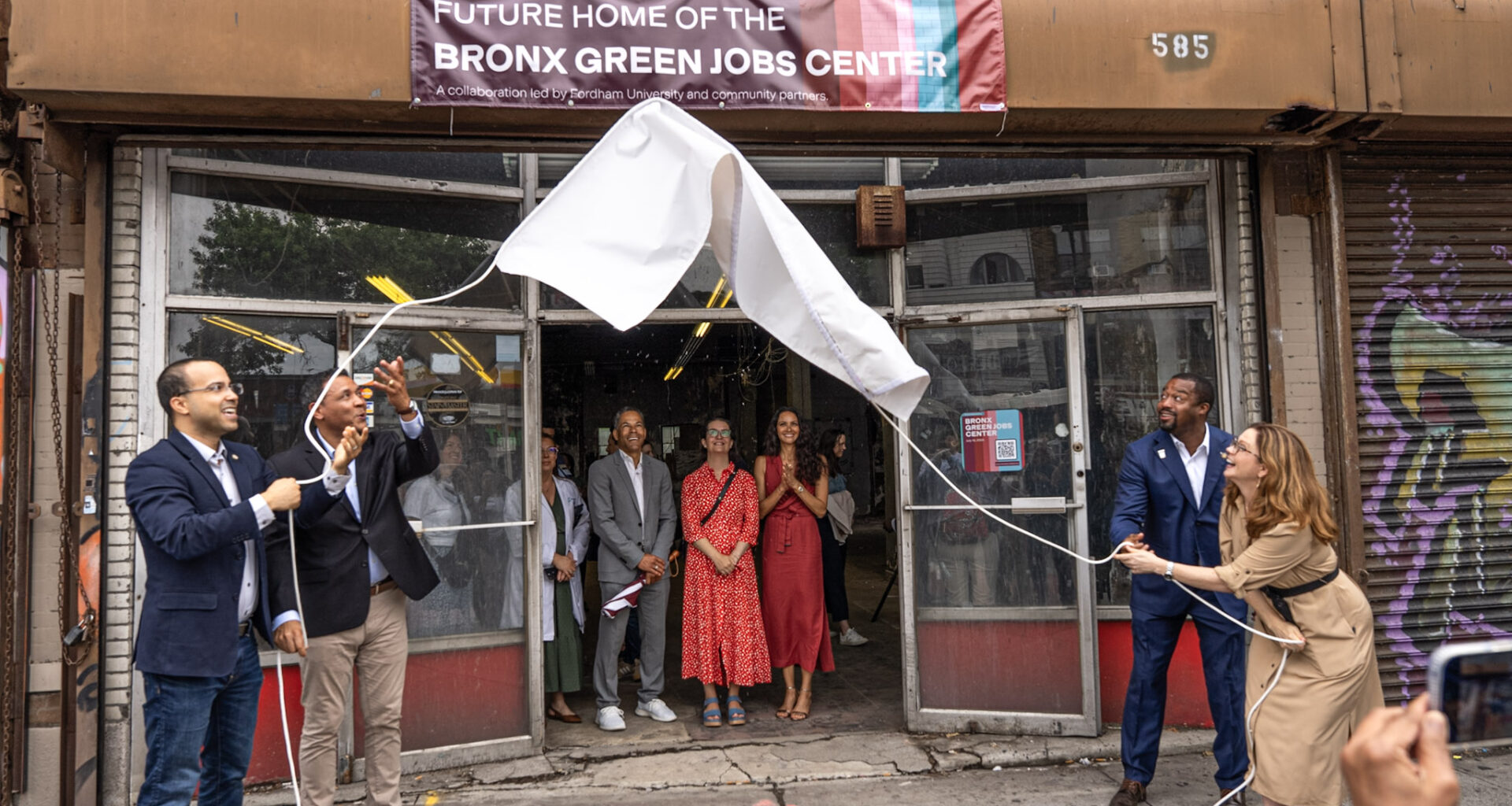 From left: NYC Councilmember Oswald Feliz, State Assemblymen George Alvarez and Landon Dais, and Fordham President Tania Tetlow. Photo: Chris Taggart