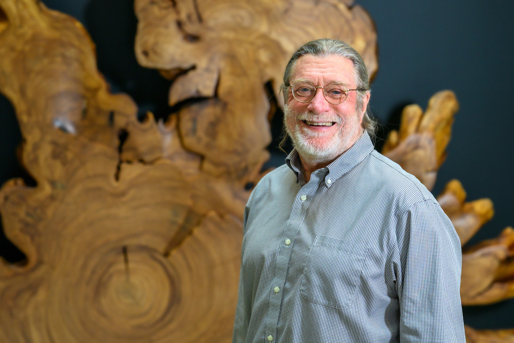 Brian Fox smiles in a portrait.