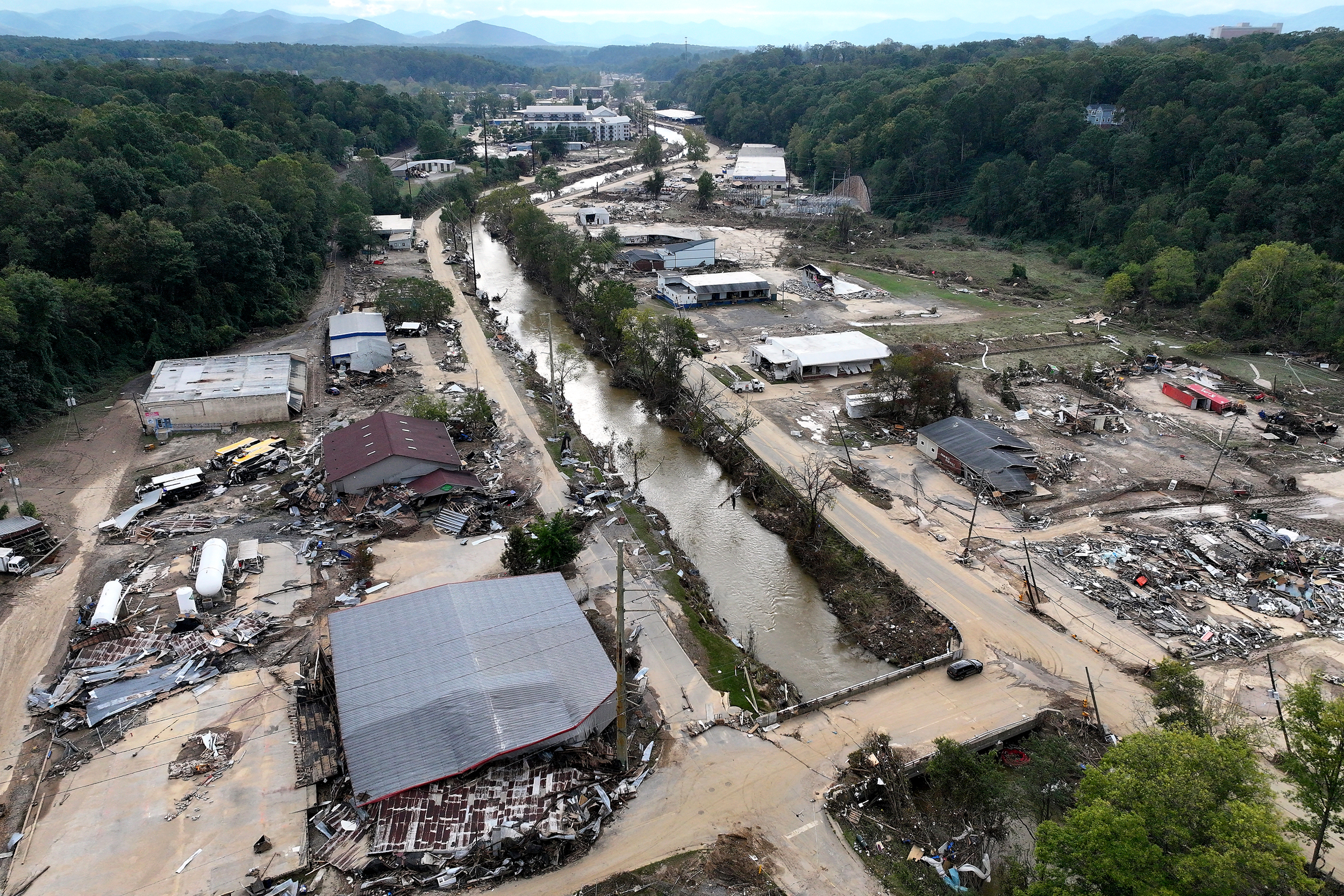 An aerial view of flood damage wrought by Hurricane Helene along the Swannanoa River on Oct. 3, 2024, in Asheville, N.C. There were 27 confirmed weather and climate disasters last year with losses exceeding $1 billion in the United States. Credit: Mario Tama/Getty Images