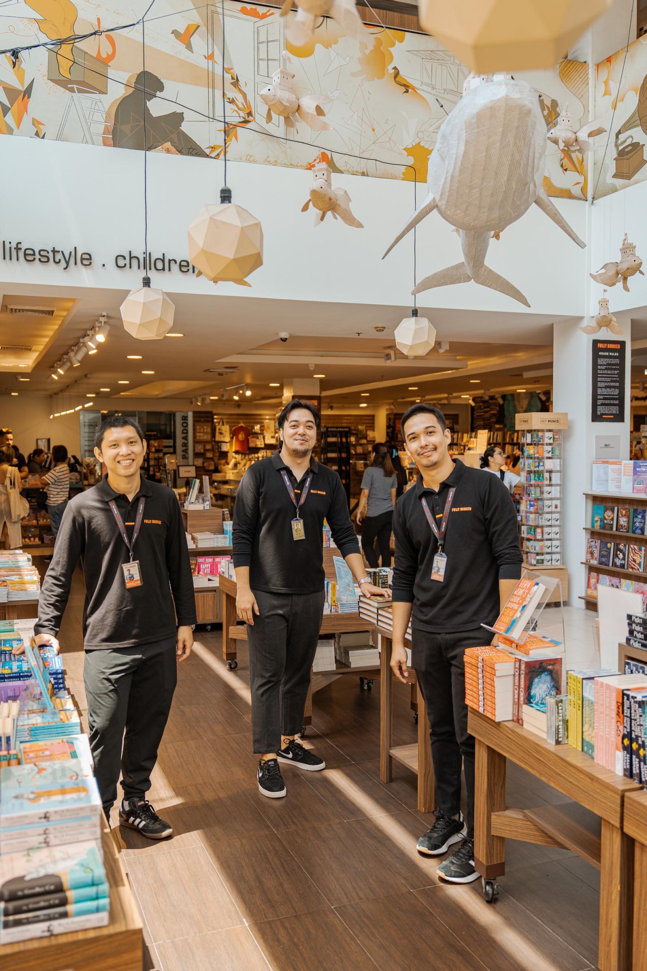 Staff pictured inside Fully Booked BGC shop