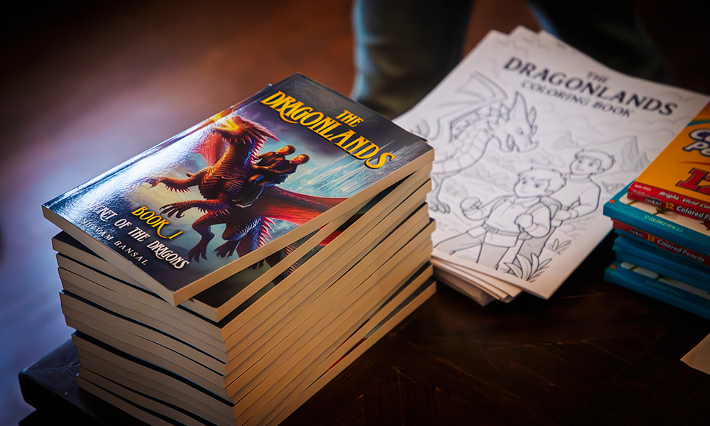 A stack of Shivam Bansal's novels sits on a table.