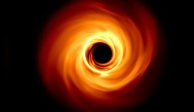 A spinning black hole graphic.