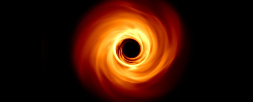 A spinning black hole graphic.