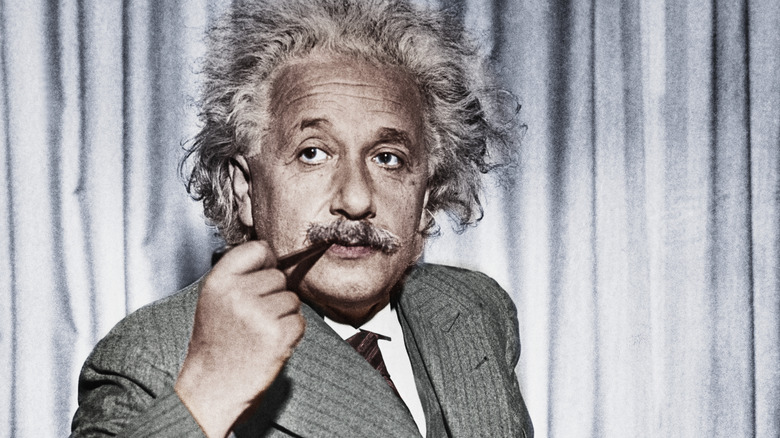 Albert Einstein with pipe in mouth