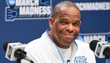 Mar 20, 2025; Milwaukee, WI, USA;  North Carolina Tar Heels head coach Hubert Davis speaks at press conference during NCAA Tournament First Round Practice at Fiserv Forum. Mandatory Credit: Benny Sieu-Imagn Images