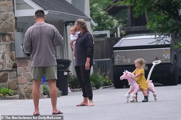 The couple were exclusively pictured at the sprawling estate the day prior to the funeral