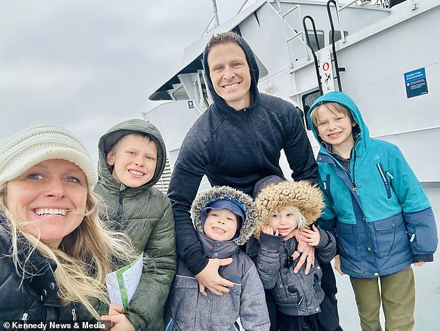 Lily, second from right in front of her father, is pictured with her family. After the terrifying ordeal, her mother disposed of her toys that used the same type of batteries
