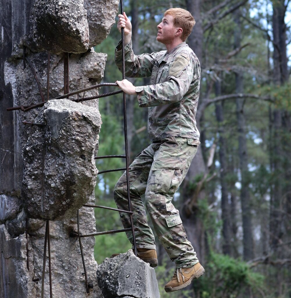 SWCS Students Climb, Scale, Rapel, Traverse Barriers During SERE Course