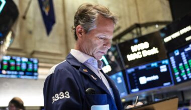 Wall Street gains, as oil ends lower in volatile trade