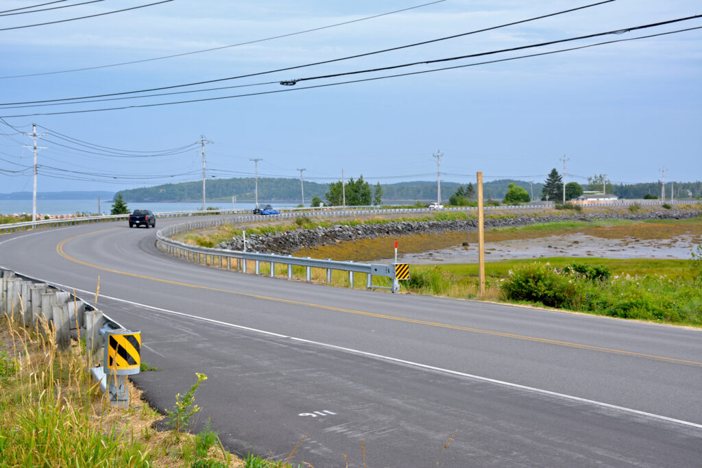 The man-made causeway that connects the Sipayik peninsula with the island of Eastport is vulnerable to flooding, and that risk is only increasing as sea levels rise. Credit: Sydney Cromwell/Inside Climate News