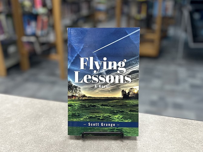 The Carson High School library has a copy Scott Grange’s book, “Flying Lessons,” in its collection. Grange, who graduated from Carson High School, published the book in April 2024.